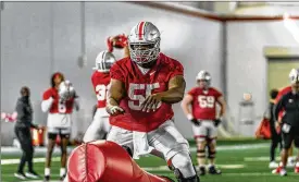  ??  ?? A bit of an afterthoug­ht a year ago at this time, Matthew Jones has been a breakout performer for Ohio State on the offensive line over the past year.