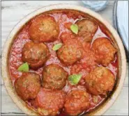  ?? MELISSA D’ARABIAN VIA ASSOCIATED PRESS ?? This photo shows lightened Italian meatballs in Bethesda, Md.