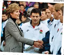  ??  ?? Diana with England rugby captain Will Carling at Cardiff Arms Park in 1995