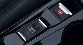  ??  ?? ● Drive mode selector sits between the front seats and lets you choose from Eco, Normal and Sport settings. Eco mode limits torque and dulls throttle response.