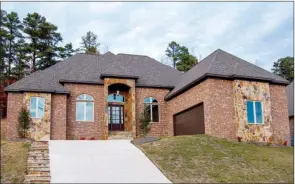  ?? LINDA GARNER-BUNCH/Arkansas Democrat-Gazette ?? This newly built home, located in Woodlands Edge, features quality   nishes and   ne details.