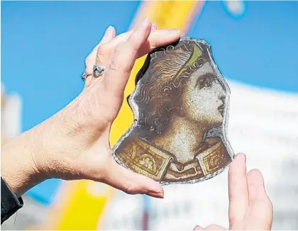  ?? Photo / Logan Church ?? A face rescued from the rose window of the Christchur­ch Cathedral, which was left in ruins after the February 2011 quake.