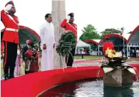  ?? AP ?? President Maithripal­a Sirisena attends a commemorat­ive ceremony marking the ninth anniversar­y to the end of Sri Lanka’s civil war at the national war heroes memorial in Colomb. —