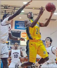  ?? DAY FILE PHOTO ?? New London’s Kris Dunn, a McDonald’s All-American and current member of the NBA’s Chicago Bulls, was named to the 25-player CIAC All-Century boys’ basketball team.