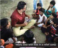  ??  ?? Manu Jose with kids in a relief camp