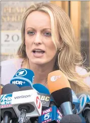  ?? THE ASSOCIATED PRESS FILE ?? Adult film actress Stormy Daniels, seen here outside federal court in New York in April, will be interviewe­d by prosecutor­s in the Southern District of New York, preparing for a potential grand jury appearance.