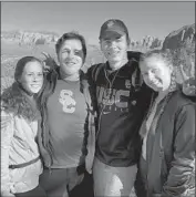  ?? Daniels Family ?? JT DANIELS enjoys a family vacation with, from left, mother Alison, father Steve and sister Madison.