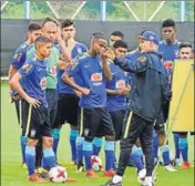  ?? SAMIR JANA/HT ?? Brazil U17 chief coach Carlos Amadeu speaks to his players before their training session in Kolkata on Saturday.