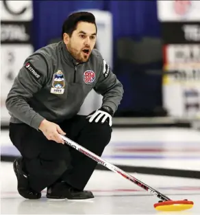  ??  ?? Skip Aaron Sluchinski calls a shot against the Dale Goehring rink on Wednesday at the Ellerslie Curling Club.