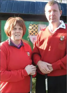  ??  ?? Lady captain Catherine Geoghegan Quinn and Mens captain Gareth Keeley at the Bellewstow­n golf club Trilby hat day Captains drive in.