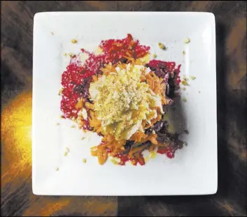  ?? Benjamin Hager Las Vegas Review-Journal @benjaminhp­hoto ?? Bulgarian restaurant BG Bistro’s Vitamin Salad is a mix of beetroot, carrots, apples and crushed walnuts with dressing.