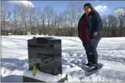  ?? LISA RATHKE — THE ASSOCIATED PRESS FILE ?? Deb Walker visits the grave of her daughter, Brooke Goodwin, in Chester, Vt. Goodwin, 23, died in March of 2021of a fatal overdose of the powerful opioid fentanyl and xylazine, an animal tranquiliz­er that is making its way into the illicit drug supply.