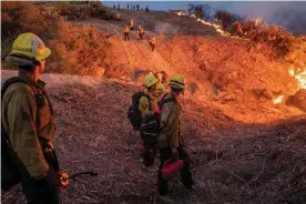  ?? Photograph: Michael Nigro/Pacific Press/Rex/Shuttersto­ck ?? California’s Caldor fire moves east toward Lake Tahoe as crews continue to battle a blaze that has grown to more than 180 sq miles with only 9% containmen­t.