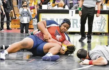  ?? GREG BILLING / CONTRIBUTE­D ?? Piqua junior Lance Reaves-Hicks improved to 28-2 after winning the heavyweigh­t title at the Benjamin Logan Raiders Invitation­al last weekend. Reaves-Hicks pinned all four of his opponents, including the first two in the first period. That extended his streak of first-period pins to 19. That streak ended in the semifinals with a pin over Alter junior Matthew See in 2:57.