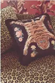  ??  ?? Tibetan Tiger Black Cushion, £43, Paloma Home, other furnishing­s from a selection, Paloma Home and Sofology.