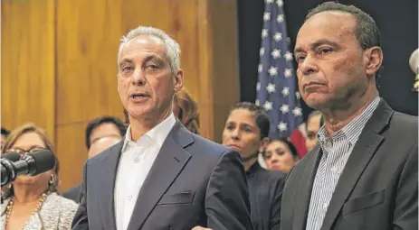  ?? | ASHLEE REZIN/ SUN- TIMES ?? Mayor Rahm Emanuel and U. S. Rep. Luis Gutierrez discuss relief for Puerto Rico on Oct. 2.