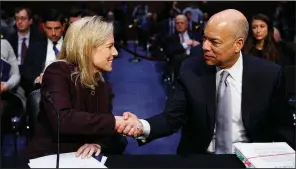  ?? AP/CAROLYN KASTER ?? Homeland Security Department Secretary Kirstjen Nielsen and the department’s former secretary, Jeh Johnson, chat Wednesday at the conclusion of a Senate Intelligen­ce Committee hearing on election security.