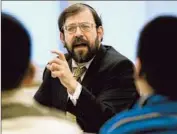  ?? Bruce Bisping Star-tribune ?? RABBI S. BINYOMIN GINSBERG, shown in 2003, says he “had hundreds of thousands of miles” earned as a frequent f lier, “and I wanted them back.”