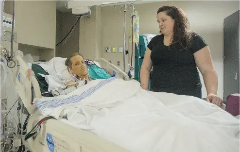  ?? LIAM RICHARDS / POSTMEDIA NEWS FILES ?? Eric Whitbread, who was denied a liver transplant because of past drinking problems by the transplant centre in Edmonton, with his wife Aimee Whitbread in the ICU at the Royal University Hospital in Saskatoon.