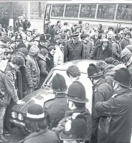  ??  ?? Pickets surroundin­g a car during the 1984 coal miners’ strike.