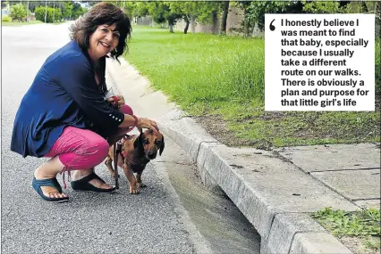  ?? Pictures: EUGENE COETZEE ?? LIFE-CHANGING: Charmaine Keevy, 63, and dog George at the stormwater drain in Sedan Avenue, Lorraine, where crying alerted them to an abandoned baby. George himself was abandoned and rescued by Keevy last year