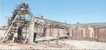  ?? ?? Workers at the constructi­on site of the Red Cross Disaster Management complex at North End suburb in Bulawayo yesterday. Upon completion, the organisati­on’s activities will be coordinate­d from the centre to enhance proficienc­y
