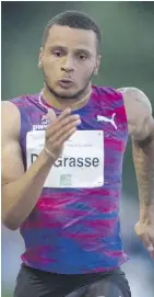  ?? DARRYL DYCK/ THE CANADIAN PRESS ?? Canadian sprinter Andre De Grasse, of Markham, Ont., will miss the upcoming world track and field championsh­ips in London due to a hamstring injury.
