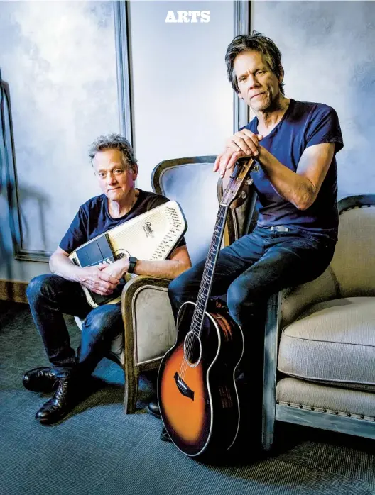  ?? JEFF FASANO ?? Michael Bacon (left) and his brother Kevin have been making music together as The Bacon Brothers since 1995.