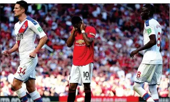  ??  ?? NOT AGAIN: Marcus Rashford is aghast after his spot-kick came back off the inside of the post