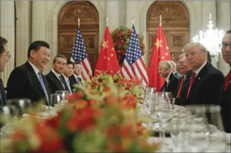  ?? PABLO MARTINEZ MONSIVAIS —THE ASSOCIATED PRESS ?? President Donald Trump meets with China’s President Xi Jinping during the G20 Summit on Saturday in Buenos Aires, Argentina.