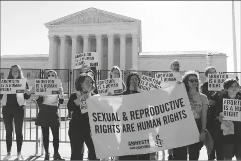  ?? JOSE LUIS MAGANA/AP ?? ABORTION RIGHTS ACTIVISTS PROTEST OUTSIDE of the U.S. Supreme Court on Wednesday,in Washington.