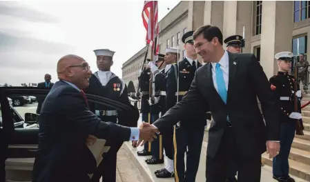  ??  ?? Mark Esper, United States Secretary of Defence greeting Ron Mark, Minister of Defence for NZ. Pentagon, January 2020.