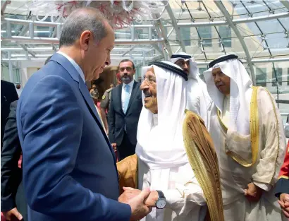  ?? AP ?? Turkey’s President Recep Tayyip Erdogan talks to the Amir of Kuwait, His Highness Sheikh Sabah Al Ahmad Al Sabah, during his departure ceremony in Kuwait City on Monday. —