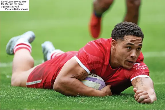  ?? ?? Lloyd Lewis scores a try for Wales in the game against Malaysia
Picture: Getty Images