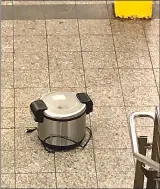  ?? Associated Press photo ?? This photo provided by NYPD shows a suspicious object which looks like a pressure cooker or electric crockpot on the floor of the New York City Subway platform on Friday.