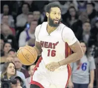  ?? AP FILE PHOTO ?? James Johnson’s versatilit­y handling the ball allowed him to initiate the Heat’s offense last year. The forward had a breakout season averaging 12 points, three assists and four rebounds per game.