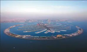  ?? PHOTOS PROVIDED TO CHINA DAILY ?? Dubai has adopted a set of initiative­s to attract Chinese travelers to visit and savor its tourist sites, including the signature Palm Islands.