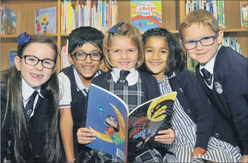  ?? PICTURE: GARY LONGBOTTOM ?? BOOK AWARDS: Pupils at Rose Court, the nursery and pre-prep of The Grammar School at Leeds reading ‘Robot Meg’ by author Vivien Sabel.