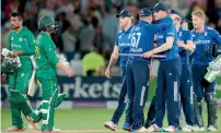  ?? — AFP ?? England’s players celebrate victory in the third ODI against Pakistan at Trent Bridge.