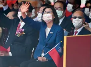  ?? (AFP) ?? Taiwan’s president Tsai Ing-wen waves during national day celebratio­ns in Taipei on Sunday.