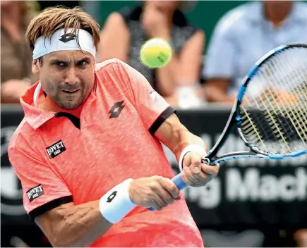  ?? PHIL WALTER/GETTY IMAGES ?? David Ferrer plays a return during his second round match against Robin Haase at the ASB Classic.