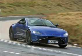  ??  ?? The new Vantage looks and sounds the part, but involves the driver terrifical­ly too