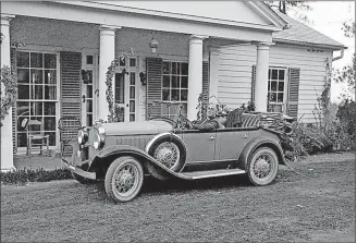  ?? [ASSOCIATED PRESS FILE PHOTO] ?? President Franklin Roosevelt sits at the wheel of his car in front of the Little White House in Warm Springs, Georgia, in 1933. He had the six-room home built the year before while he sought the presidency.