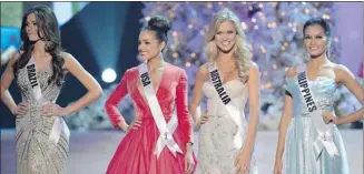  ?? Joe Klamar/afp-getty Images ?? Miss USA, Olivia Culpo, second from left, is the first American to win Miss Universe since 1977.