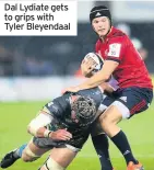  ??  ?? Dal Lydiate gets to grips with Tyler Bleyendaal