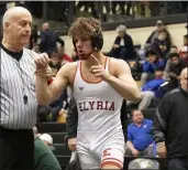  ?? JENNIFER FORBUS — FOR THE MORNING JOURNAL ?? Elyria’s Mick Burnett signals his district placement of first after defeating Zack Snyder of Anthony Wayne on March 7.