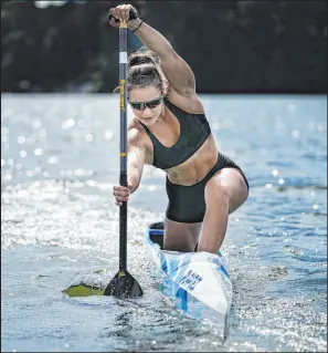  ?? Brynn Anderson The Associated Press ?? World champion Nevin Harrison, 19, of Seattle, trains near Lake Lanier Olympic Park. She’s headed for Tokyo and the debut event of women’s sprint canoe.