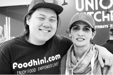  ??  ?? Foodhini founder Vang with chef Frabotta at the Union Kitchen space in Ivy City.