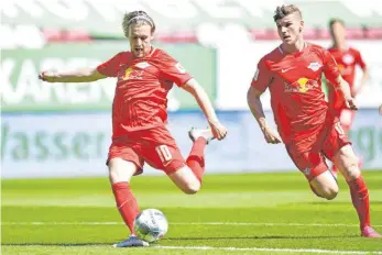  ?? FOTO: LENNARTPRE­ISS/IMAGO IMAGES ?? Königsklas­sensieger aus Leipzig? Timo Werner (re.) kann dabei nicht helfen, Emil Forsberg schon.