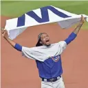  ?? DAVID RICHARD/USA TODAY SPORTS ?? Cubs relief pitcher Carl Edwards (6) celebrates after defeating the Indians in Game 7 of the World Series on Nov. 2 at Progressiv­e Field in Cleveland.